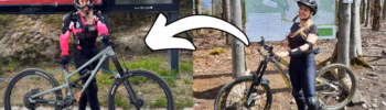 Blonde Frau zeigt ihre Mountainbike Ausrüstung